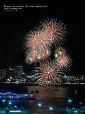 Fireworks over cityscape by the beach and sea surrounding with hotels, restaurant, and service boats and cruises sign of cristmas/ New Year eve and special festival.